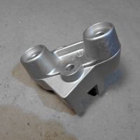 Držák stupačky řidiče levý MOTO GUZZI V7 a V9