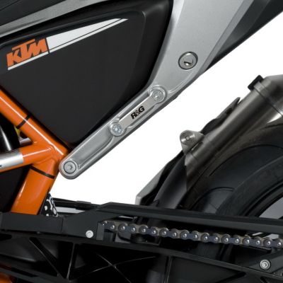 Záslepky otvorů pro zadní stupačky (levá strana, stříbrná), KTM 690 Duke '12 / 690 Duke R '13-